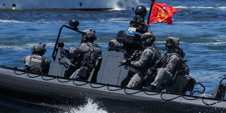 kaohsiung-taiwan-june-08-taiwan-coast-guard-special-task-unit-members-onboard-a-speedboat-during-a-joint-forces-exercise-in.jpg